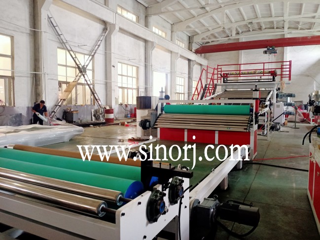 仿大理石板生產(chǎn)線，地板革生產(chǎn)線，三輥四輥集裝箱發(fā)貨中